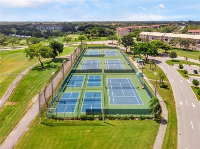 This spectacular 2-bedroom, 2-bathroom home offers a spacious on Flamingo Lakes Country Club in Florida - for sale on GolfHomes.com, golf home, golf lot