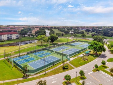 This spectacular 2-bedroom, 2-bathroom home offers a spacious on Flamingo Lakes Country Club in Florida - for sale on GolfHomes.com, golf home, golf lot