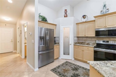 Located in the secure, private gated community of Sabal Trace on Sabal Trace Golf and Country Club in Florida - for sale on GolfHomes.com, golf home, golf lot