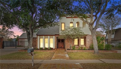 Experience elegant living in this spacious 4-bedroom, 4-bath on Corpus Christi Country Club Golf Course in Texas - for sale on GolfHomes.com, golf home, golf lot