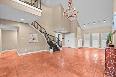 Experience elegant living in this spacious 4-bedroom, 4-bath on Corpus Christi Country Club Golf Course in Texas - for sale on GolfHomes.com, golf home, golf lot