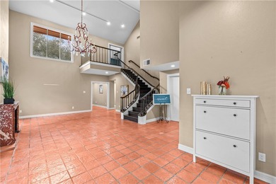 Experience elegant living in this spacious 4-bedroom, 4-bath on Corpus Christi Country Club Golf Course in Texas - for sale on GolfHomes.com, golf home, golf lot