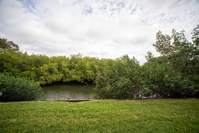 This ground-floor, inlet-front condo in the newest building at on Cove Cay Country Club in Florida - for sale on GolfHomes.com, golf home, golf lot