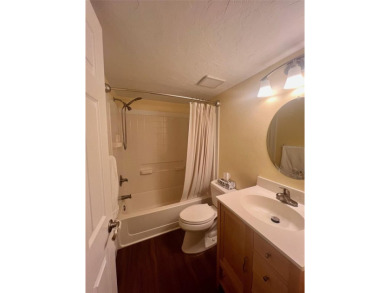 Welcome to this stunning 2-bedroom, 2-bathroom first-floor condo on East Lake Woodlands Country Club in Florida - for sale on GolfHomes.com, golf home, golf lot