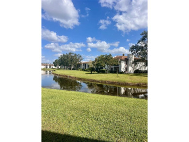 Welcome to this stunning 2-bedroom, 2-bathroom first-floor condo on East Lake Woodlands Country Club in Florida - for sale on GolfHomes.com, golf home, golf lot