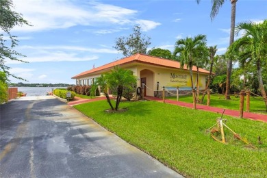 GROUND FLOOR end unit with BRND NEW IMPACT WINDOWS. Enjoy Peace on Monterey Yacht and Country Club in Florida - for sale on GolfHomes.com, golf home, golf lot