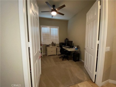 Welcome to this beautifully upgraded Emerald model home, located on Oak Valley Golf Club in California - for sale on GolfHomes.com, golf home, golf lot
