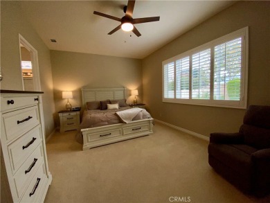 Welcome to this beautifully upgraded Emerald model home, located on Oak Valley Golf Club in California - for sale on GolfHomes.com, golf home, golf lot