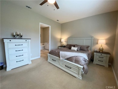 Welcome to this beautifully upgraded Emerald model home, located on Oak Valley Golf Club in California - for sale on GolfHomes.com, golf home, golf lot