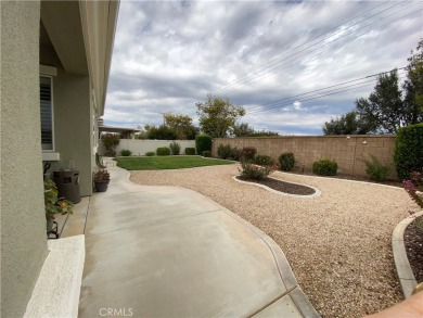 Welcome to this beautifully upgraded Emerald model home, located on Oak Valley Golf Club in California - for sale on GolfHomes.com, golf home, golf lot