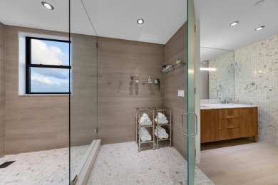 Over 3000 sqft of living space, this fully renovated turn-key PH on Boca Pointe Country Club in Florida - for sale on GolfHomes.com, golf home, golf lot