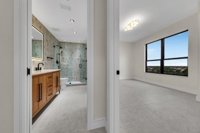Over 3000 sqft of living space, this fully renovated turn-key PH on Boca Pointe Country Club in Florida - for sale on GolfHomes.com, golf home, golf lot
