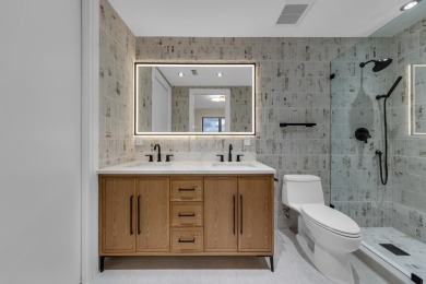 Over 3000 sqft of living space, this fully renovated turn-key PH on Boca Pointe Country Club in Florida - for sale on GolfHomes.com, golf home, golf lot