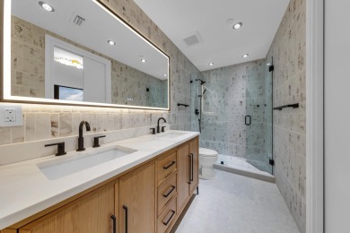 Over 3000 sqft of living space, this fully renovated turn-key PH on Boca Pointe Country Club in Florida - for sale on GolfHomes.com, golf home, golf lot