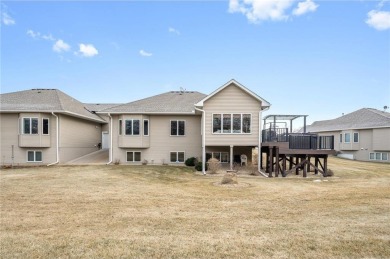 Beautifully set on a peaceful lot overlooking the 7th hole of on Majestic Oaks Golf Club  in Minnesota - for sale on GolfHomes.com, golf home, golf lot