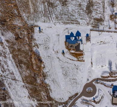 Nestled on over 2 acres of picturesque land, this custom-built on Rifle Creek Golf Course in Colorado - for sale on GolfHomes.com, golf home, golf lot