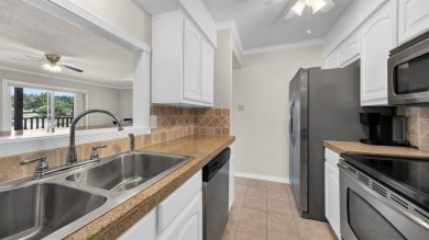 This charming waterfront condo offers a fantastic opportunity to on De Cordova Bend Country Club in Texas - for sale on GolfHomes.com, golf home, golf lot