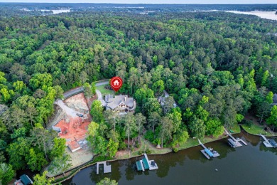 Welcome to your serene lakefront retreat in the prestigious on Reynolds Lake Oconee - The Oconee in Georgia - for sale on GolfHomes.com, golf home, golf lot