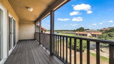 This charming waterfront condo offers a fantastic opportunity to on De Cordova Bend Country Club in Texas - for sale on GolfHomes.com, golf home, golf lot