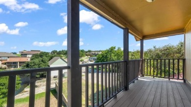 This charming waterfront condo offers a fantastic opportunity to on De Cordova Bend Country Club in Texas - for sale on GolfHomes.com, golf home, golf lot