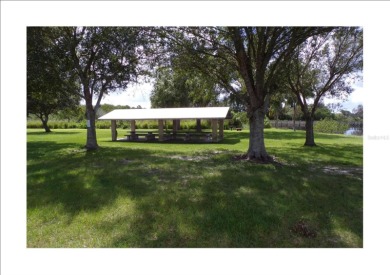 This lot is on a quiet street that would be a great place to on Live Oak Golf Club and RV Park in Florida - for sale on GolfHomes.com, golf home, golf lot