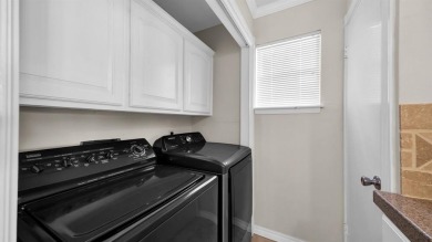 This charming waterfront condo offers a fantastic opportunity to on De Cordova Bend Country Club in Texas - for sale on GolfHomes.com, golf home, golf lot