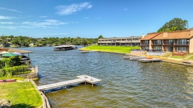 This charming waterfront condo offers a fantastic opportunity to on De Cordova Bend Country Club in Texas - for sale on GolfHomes.com, golf home, golf lot