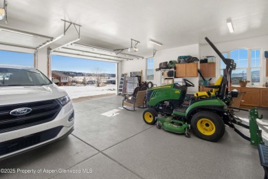 Nestled on over 2 acres of picturesque land, this custom-built on Rifle Creek Golf Course in Colorado - for sale on GolfHomes.com, golf home, golf lot