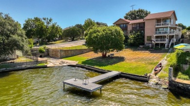 This charming waterfront condo offers a fantastic opportunity to on De Cordova Bend Country Club in Texas - for sale on GolfHomes.com, golf home, golf lot