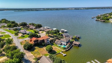 This charming waterfront condo offers a fantastic opportunity to on De Cordova Bend Country Club in Texas - for sale on GolfHomes.com, golf home, golf lot