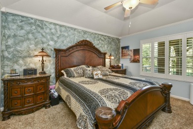 Perched overlooking the golf course, this  two-bedroom on Pointe Royale Village Country Club in Missouri - for sale on GolfHomes.com, golf home, golf lot