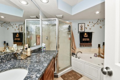Perched overlooking the golf course, this  two-bedroom on Pointe Royale Village Country Club in Missouri - for sale on GolfHomes.com, golf home, golf lot