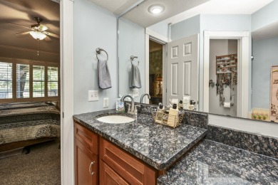 Perched overlooking the golf course, this  two-bedroom on Pointe Royale Village Country Club in Missouri - for sale on GolfHomes.com, golf home, golf lot