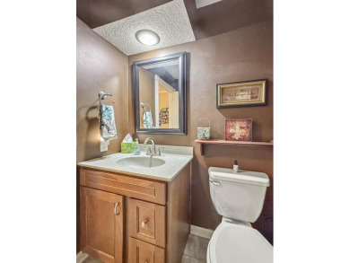 Perched overlooking the golf course, this  two-bedroom on Pointe Royale Village Country Club in Missouri - for sale on GolfHomes.com, golf home, golf lot