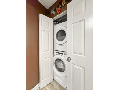 Perched overlooking the golf course, this  two-bedroom on Pointe Royale Village Country Club in Missouri - for sale on GolfHomes.com, golf home, golf lot