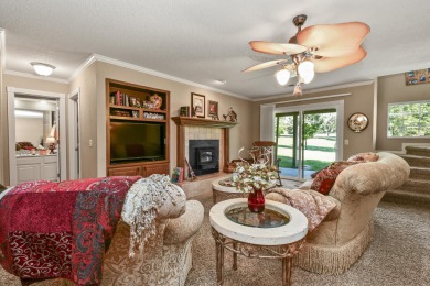 Perched overlooking the golf course, this  two-bedroom on Pointe Royale Village Country Club in Missouri - for sale on GolfHomes.com, golf home, golf lot