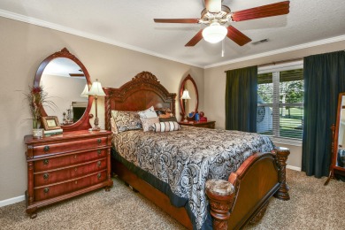 Perched overlooking the golf course, this  two-bedroom on Pointe Royale Village Country Club in Missouri - for sale on GolfHomes.com, golf home, golf lot