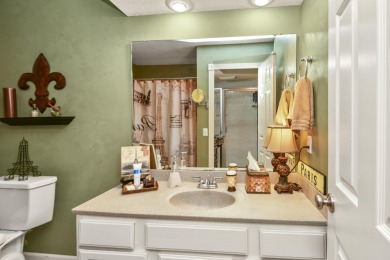 Perched overlooking the golf course, this  two-bedroom on Pointe Royale Village Country Club in Missouri - for sale on GolfHomes.com, golf home, golf lot