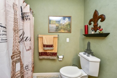 Perched overlooking the golf course, this  two-bedroom on Pointe Royale Village Country Club in Missouri - for sale on GolfHomes.com, golf home, golf lot