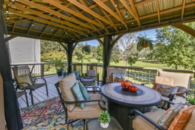 Perched overlooking the golf course, this  two-bedroom on Pointe Royale Village Country Club in Missouri - for sale on GolfHomes.com, golf home, golf lot