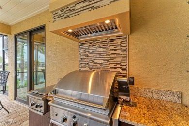 WATERFRONT LUXURY AWAITS at this gorgeous 2013 built custom POOL on Saint Andrews South Golf Club in Florida - for sale on GolfHomes.com, golf home, golf lot