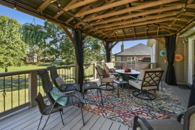 Perched overlooking the golf course, this  two-bedroom on Pointe Royale Village Country Club in Missouri - for sale on GolfHomes.com, golf home, golf lot