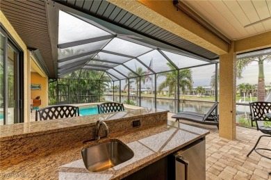 WATERFRONT LUXURY AWAITS at this gorgeous 2013 built custom POOL on Saint Andrews South Golf Club in Florida - for sale on GolfHomes.com, golf home, golf lot