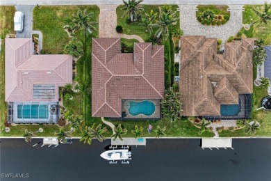 WATERFRONT LUXURY AWAITS at this gorgeous 2013 built custom POOL on Saint Andrews South Golf Club in Florida - for sale on GolfHomes.com, golf home, golf lot