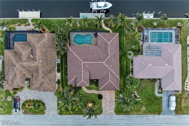 WATERFRONT LUXURY AWAITS at this gorgeous 2013 built custom POOL on Saint Andrews South Golf Club in Florida - for sale on GolfHomes.com, golf home, golf lot