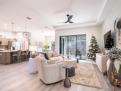 Welcome to this impressive 2023 Sweetwater built home tucked on Sugarmill Woods Golf and Country Club in Florida - for sale on GolfHomes.com, golf home, golf lot