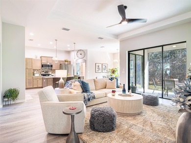 Welcome to this impressive 2023 Sweetwater built home tucked on Sugarmill Woods Golf and Country Club in Florida - for sale on GolfHomes.com, golf home, golf lot