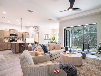 Welcome to this impressive 2023 Sweetwater built home tucked on Sugarmill Woods Golf and Country Club in Florida - for sale on GolfHomes.com, golf home, golf lot