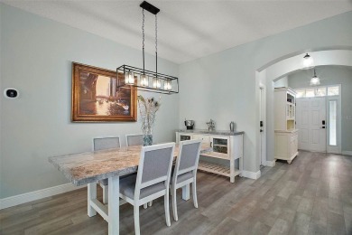 BOND PAID! STUNNING TURNKEY SOMERSET MODEL WITH GOLF CART on Mallory Hill Golf and Country Club in Florida - for sale on GolfHomes.com, golf home, golf lot