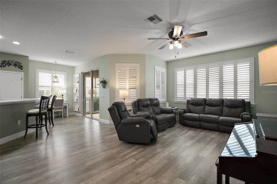BOND PAID! STUNNING TURNKEY SOMERSET MODEL WITH GOLF CART on Mallory Hill Golf and Country Club in Florida - for sale on GolfHomes.com, golf home, golf lot